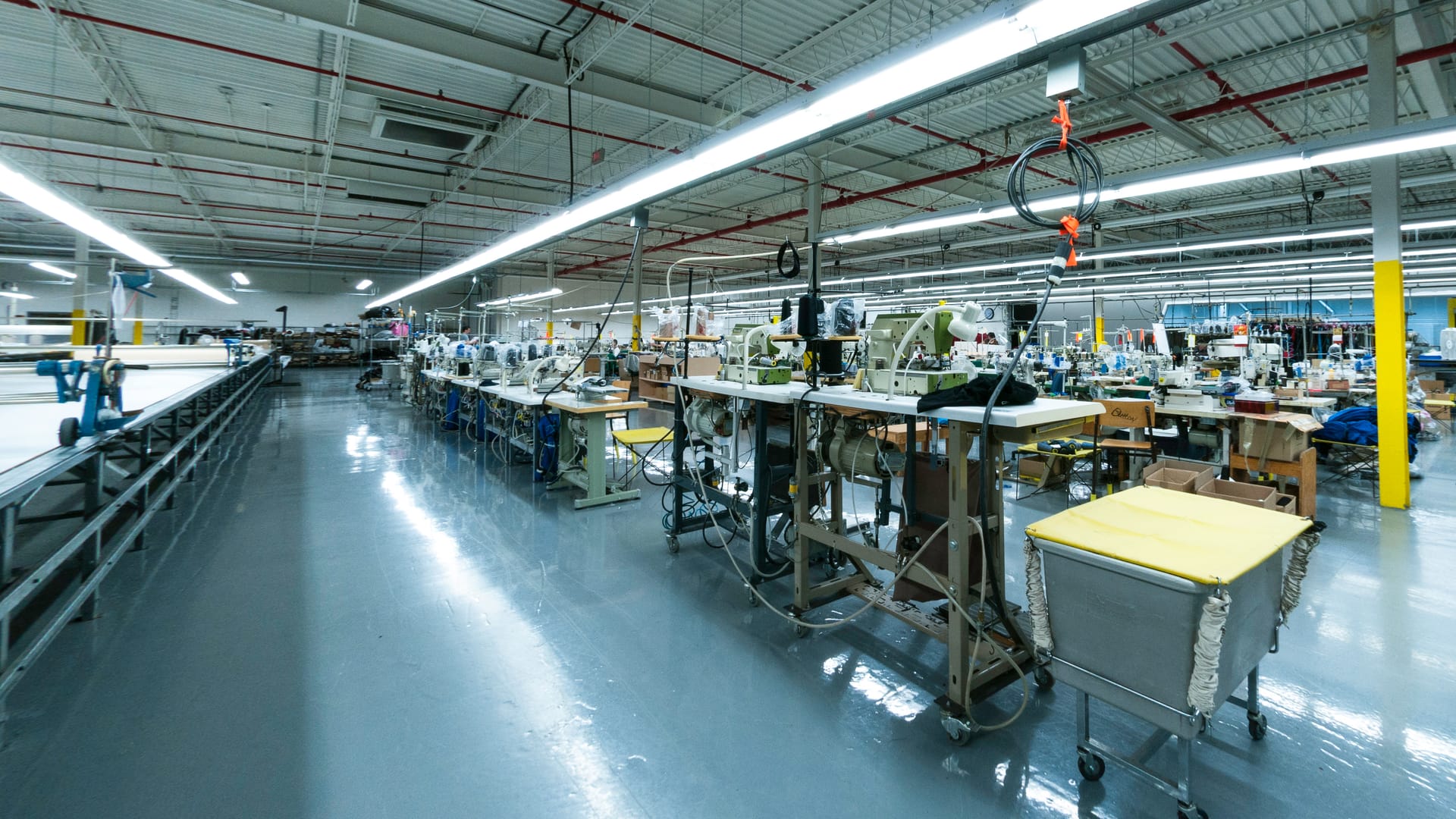 Panoramic view down the full length of the MyantX production floor