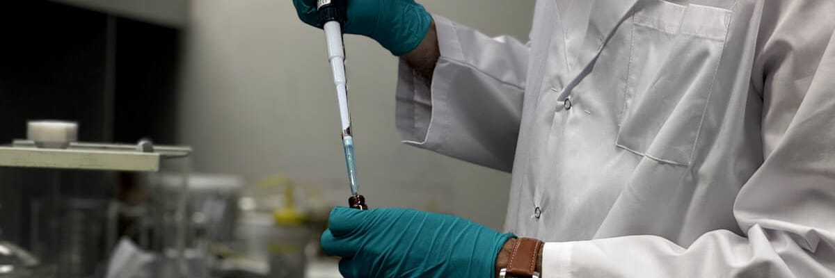 A MyantX scientist performing materials analysis at the bench