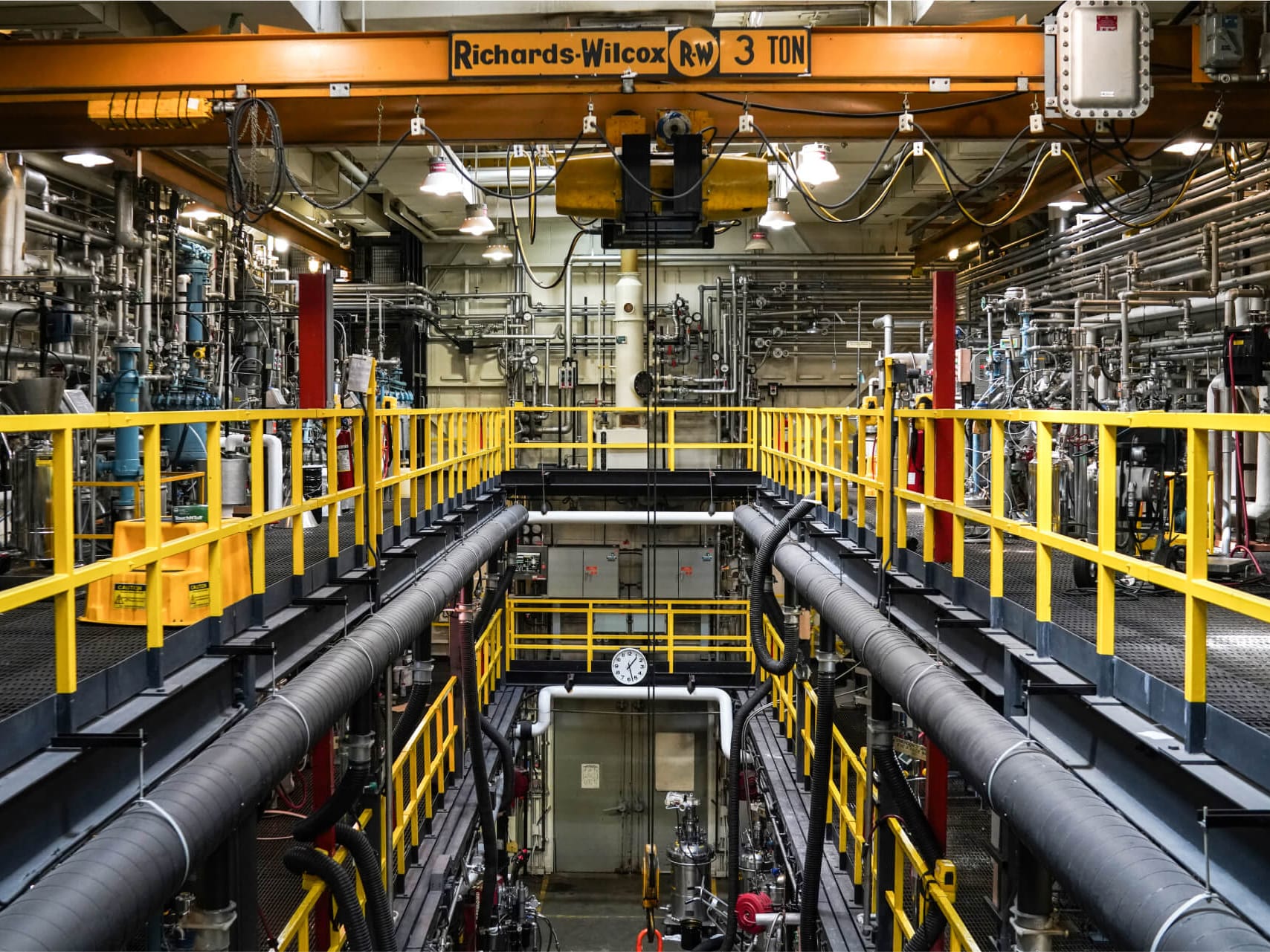 The advanced-manufacturing floor — flat-bed knitting machines running production