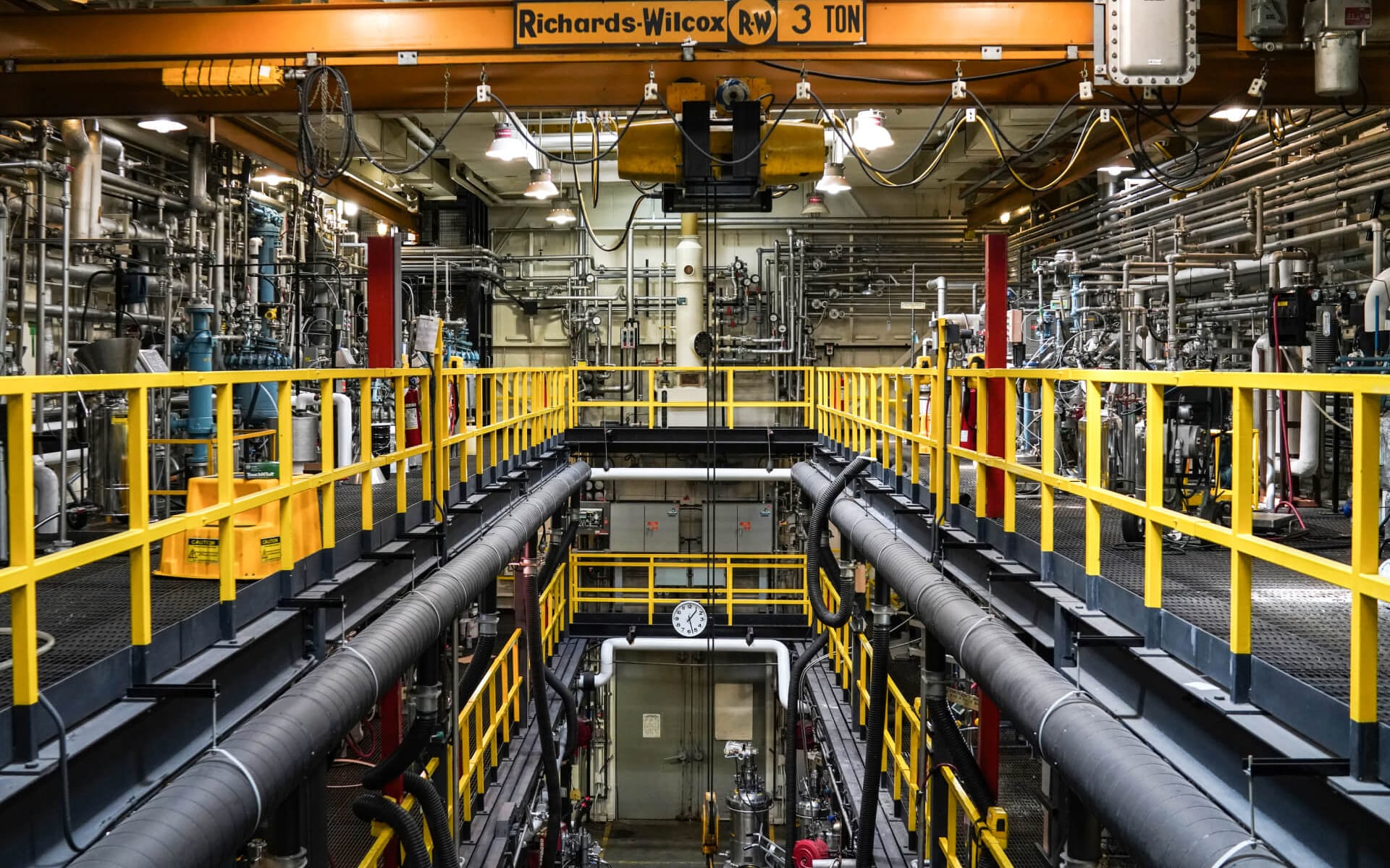 The advanced-manufacturing floor — flat-bed knitting machines running production