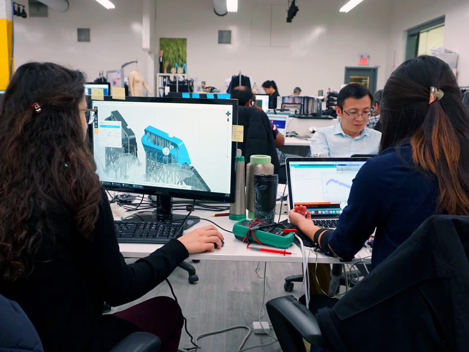 MyantX engineers at work on connected-product development